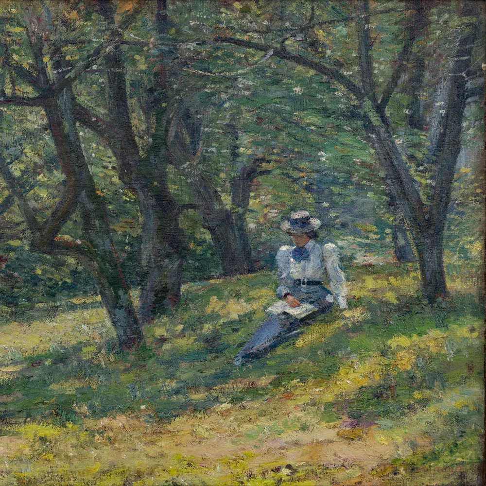 An impressionist painting by Theodore Robinson (1852–1896) that depicts a woman seated in an orchard reading a book . Oil on canvas, 18 x 22 in. (detail)