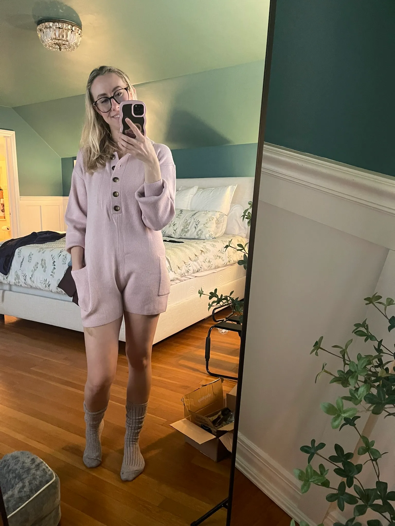 Melinda Godel, Pink Romper, Gray Socks